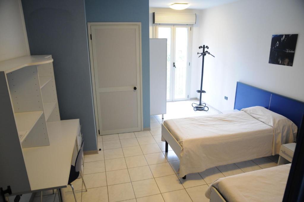 Aparthotel Casa Marcolini Facella Brescia Habitación foto